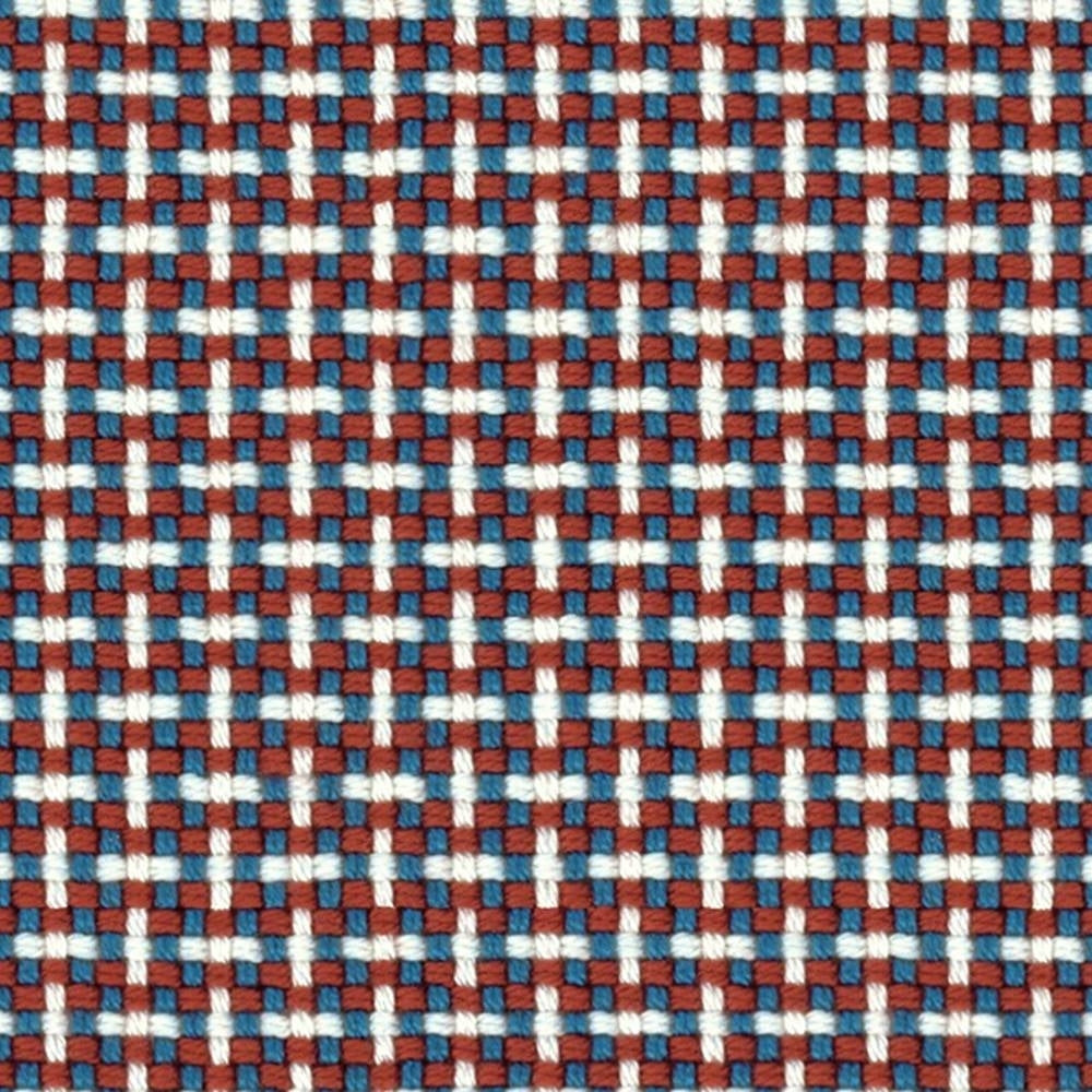 Close-up of 100% acrylic upholstery fabric showing a small check weave of red, blue and white threads for a contemporary sofa.