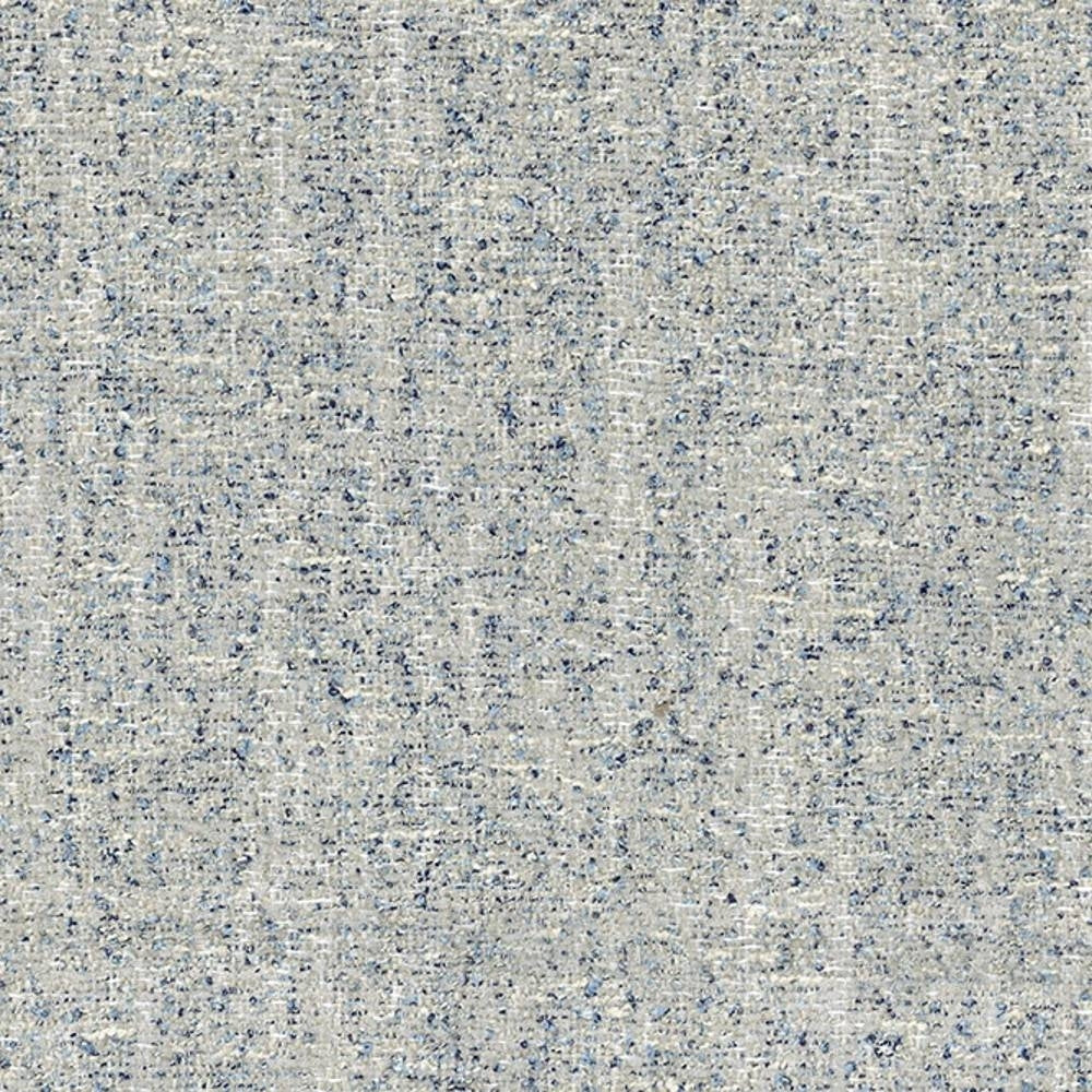 Close-up of neutral beige woven sofa upholstery fabric in a polyester-cotton-viscose blend, showing subtle blue flecks and a textured contemporary weave.