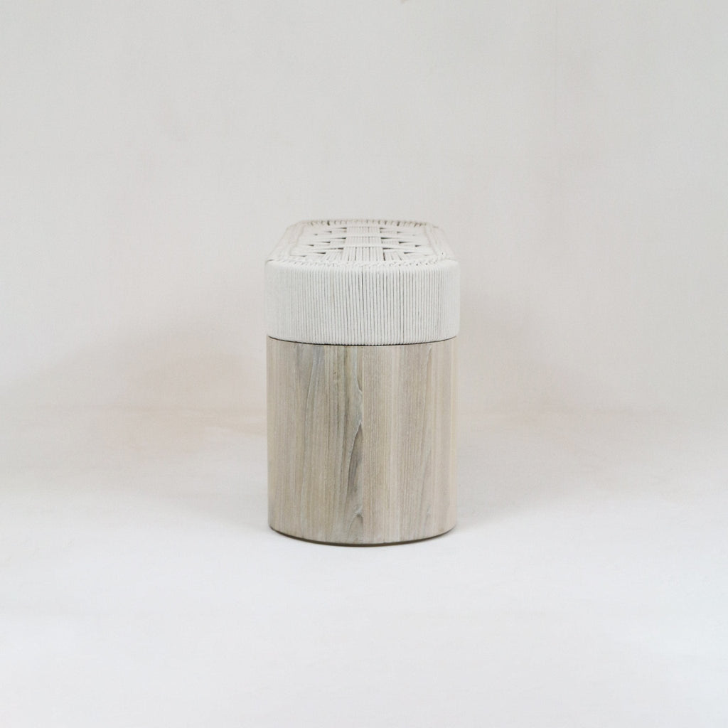 Modern entry bench with a cylindrical natural oak base and a white woven fabric seat, shown centered on a neutral background.