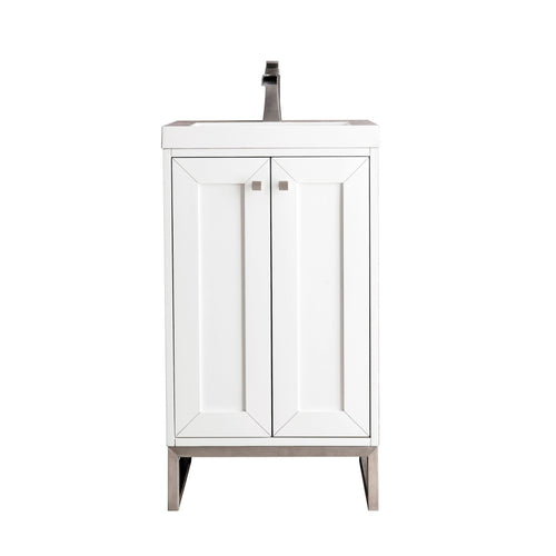 Modern freestanding single-sink bathroom vanity in white solid wood with a stone top, integrated rectangular ceramic basin, brushed-nickel square knobs and metal legs, plus two paneled doors for concealed storage.
