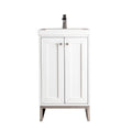 Modern freestanding single-sink bathroom vanity in white solid wood with a stone top, integrated rectangular ceramic basin, brushed-nickel square knobs and metal legs, plus two paneled doors for concealed storage.