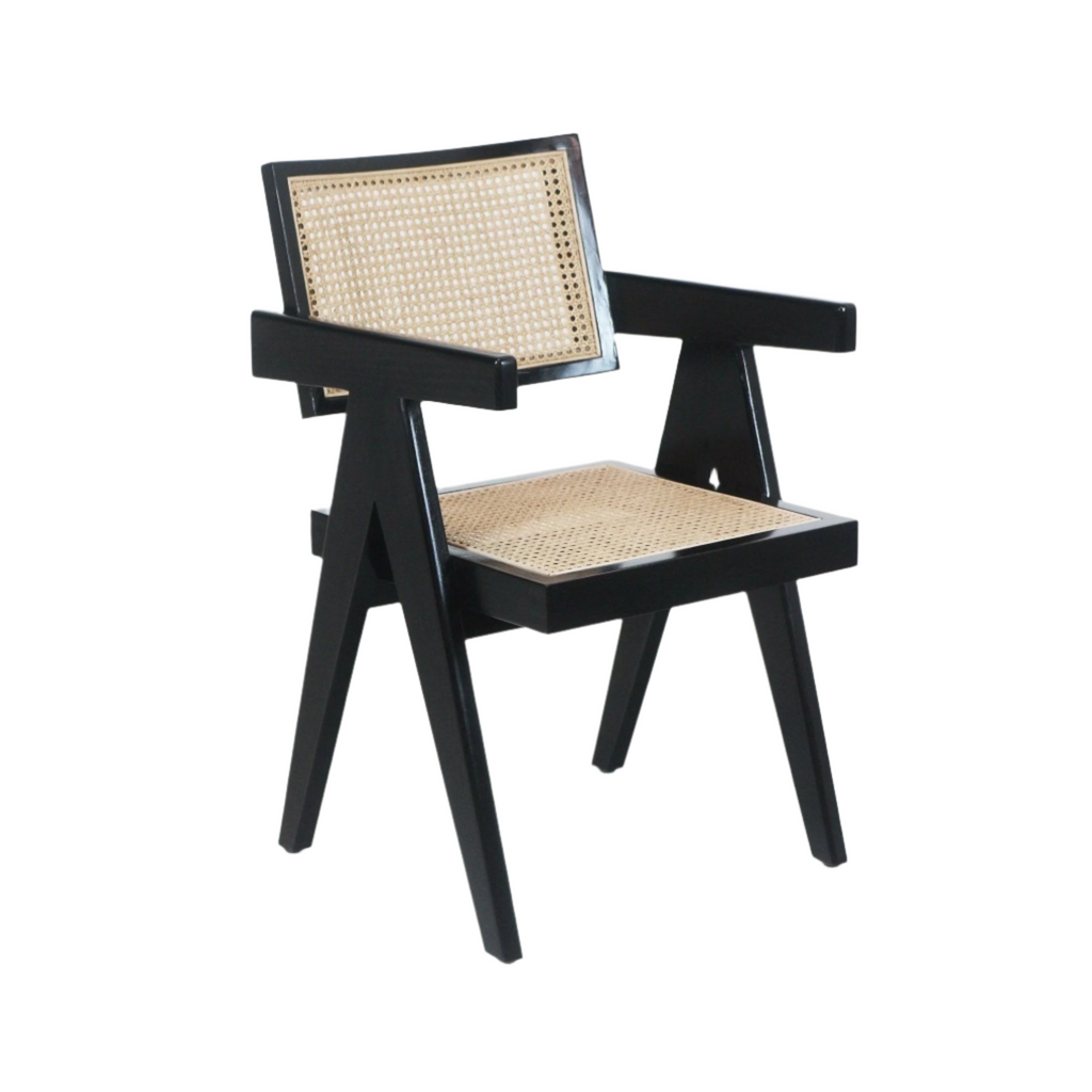 Black solid-wood dining armchair with natural woven cane seat and back, angular mid-century modern frame with straight arms and tapered legs.