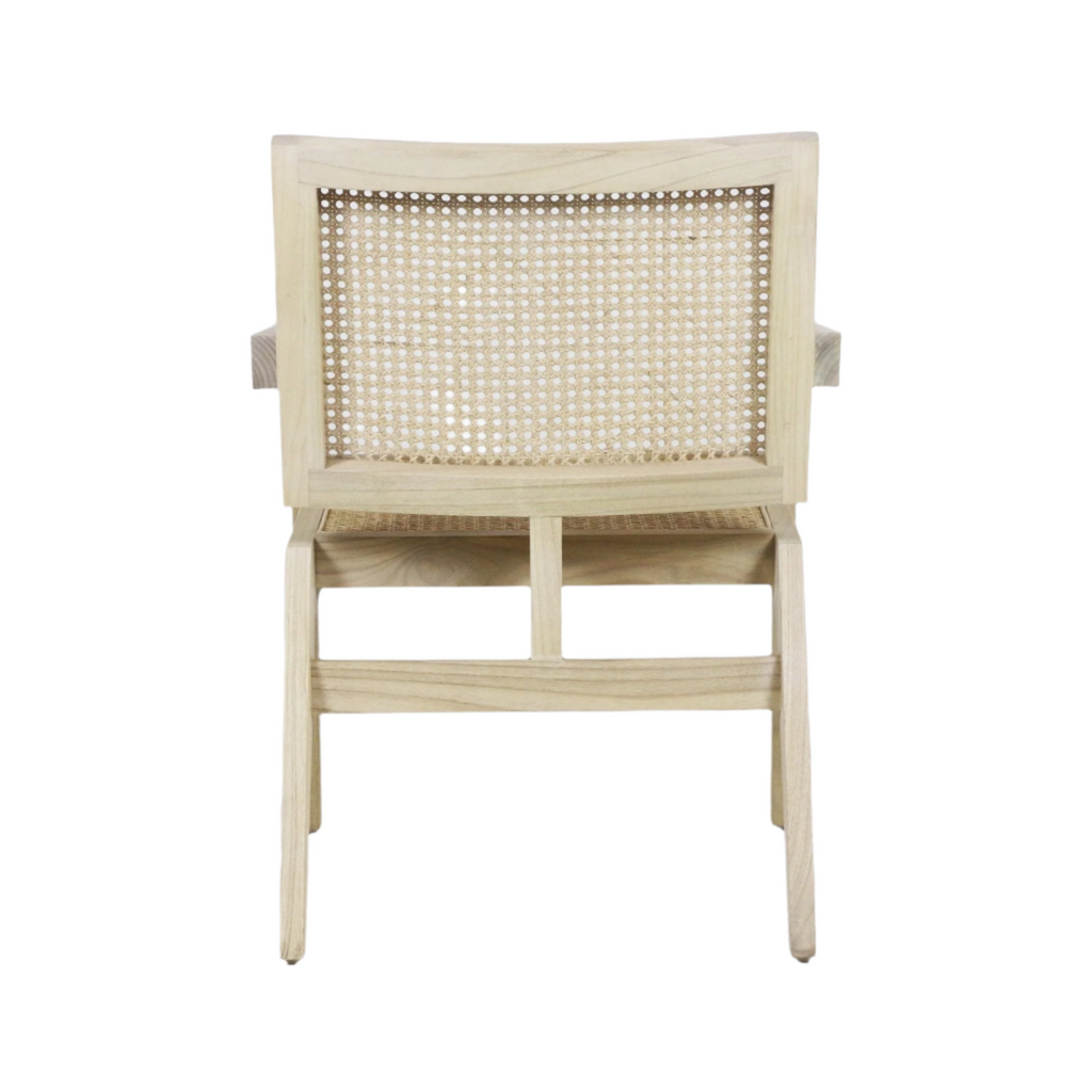 Rear view of a natural wood lounge chair showing a woven cane back and seat, solid wood frame in a light teak finish with slender tapered legs, mid-century modern Scandinavian styling.