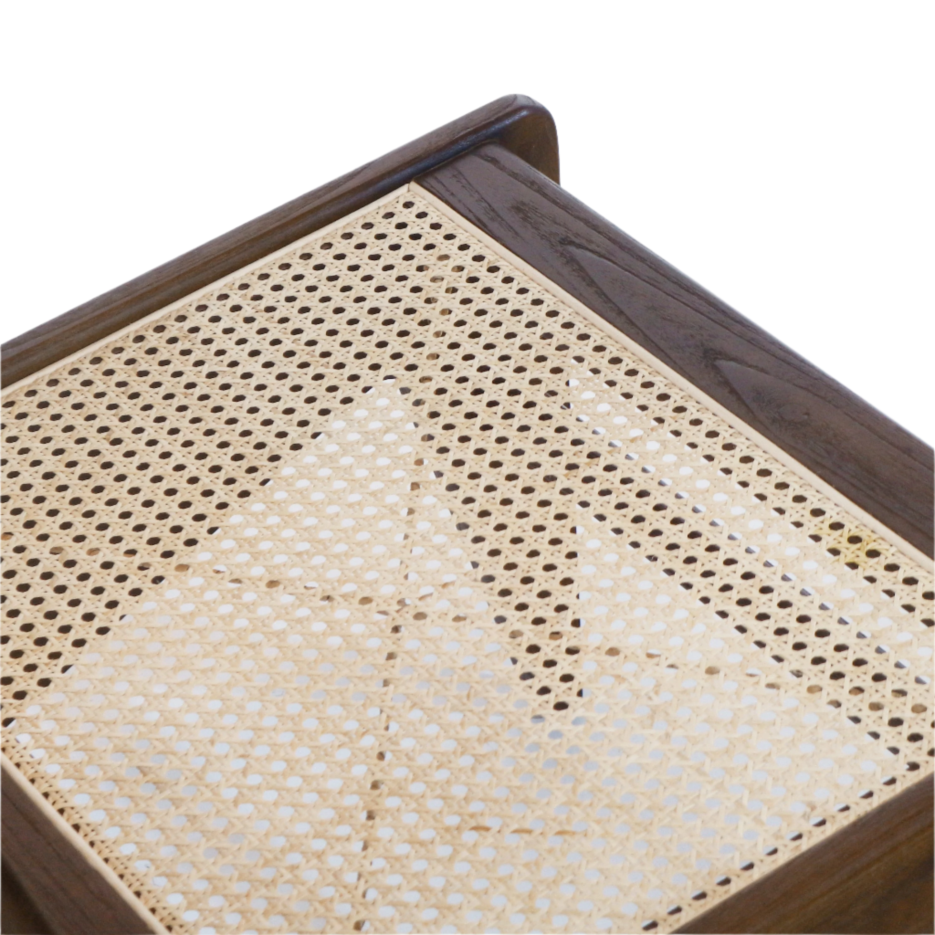 Close-up of a natural beige woven cane seat inset in a dark teak solid wood frame, highlighting the hexagonal cane pattern and visible corner joinery.