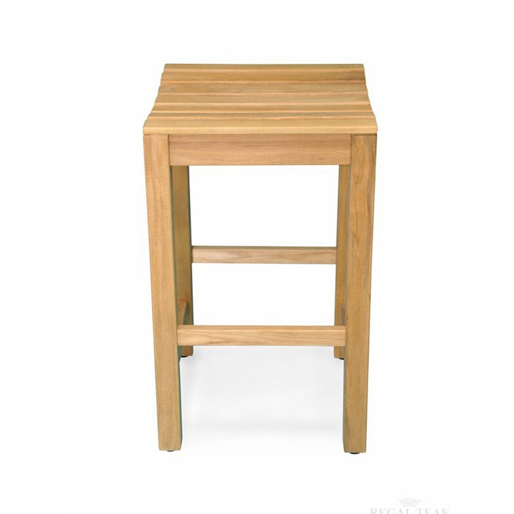 Backless outdoor bar stool in natural teak with a slatted square seat, straight square legs and two horizontal support rails serving as footrests, shown on a white background in a coastal, minimalist style.