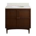 Freestanding 30-inch coastal solid wood vanity in dark brown with a white stone countertop and oval integrated sink, two recessed-panel doors with brass knobs and tapered legs.