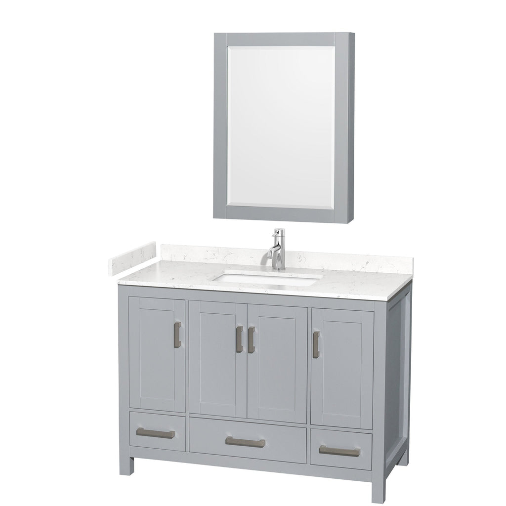 48-inch modern gray wood bathroom vanity with stone countertop and integrated rectangular sink, chrome faucet, three cabinet doors and three lower drawers with brushed metal handles, paired with a matching framed mirror.