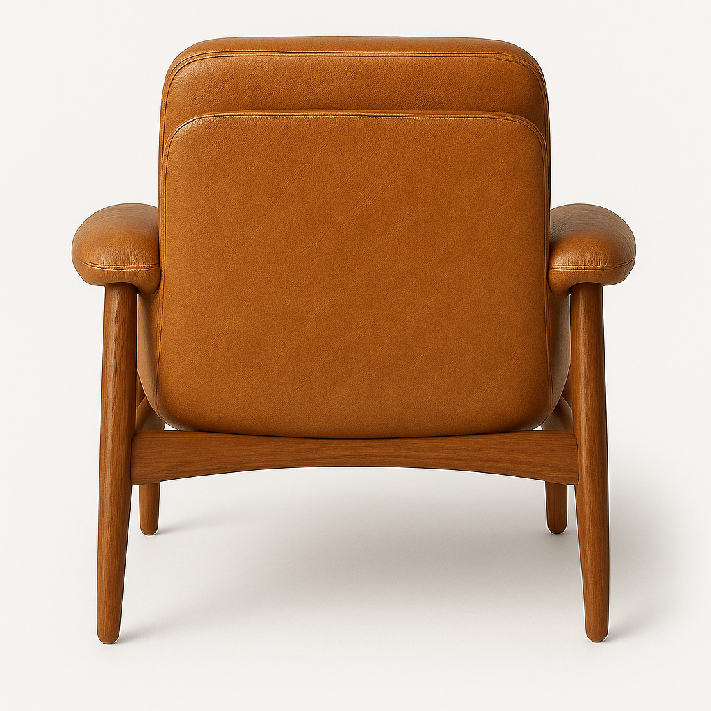 Rear view of a lounge chair upholstered in warm brown leather with rounded padded arms and back, supported by a smooth solid wood frame and tapered legs against a white background.