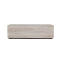 Low rectangular coffee table made from natural beige travertine with a clean block silhouette and a thin dark wood plinth base in a modern, contemporary style.