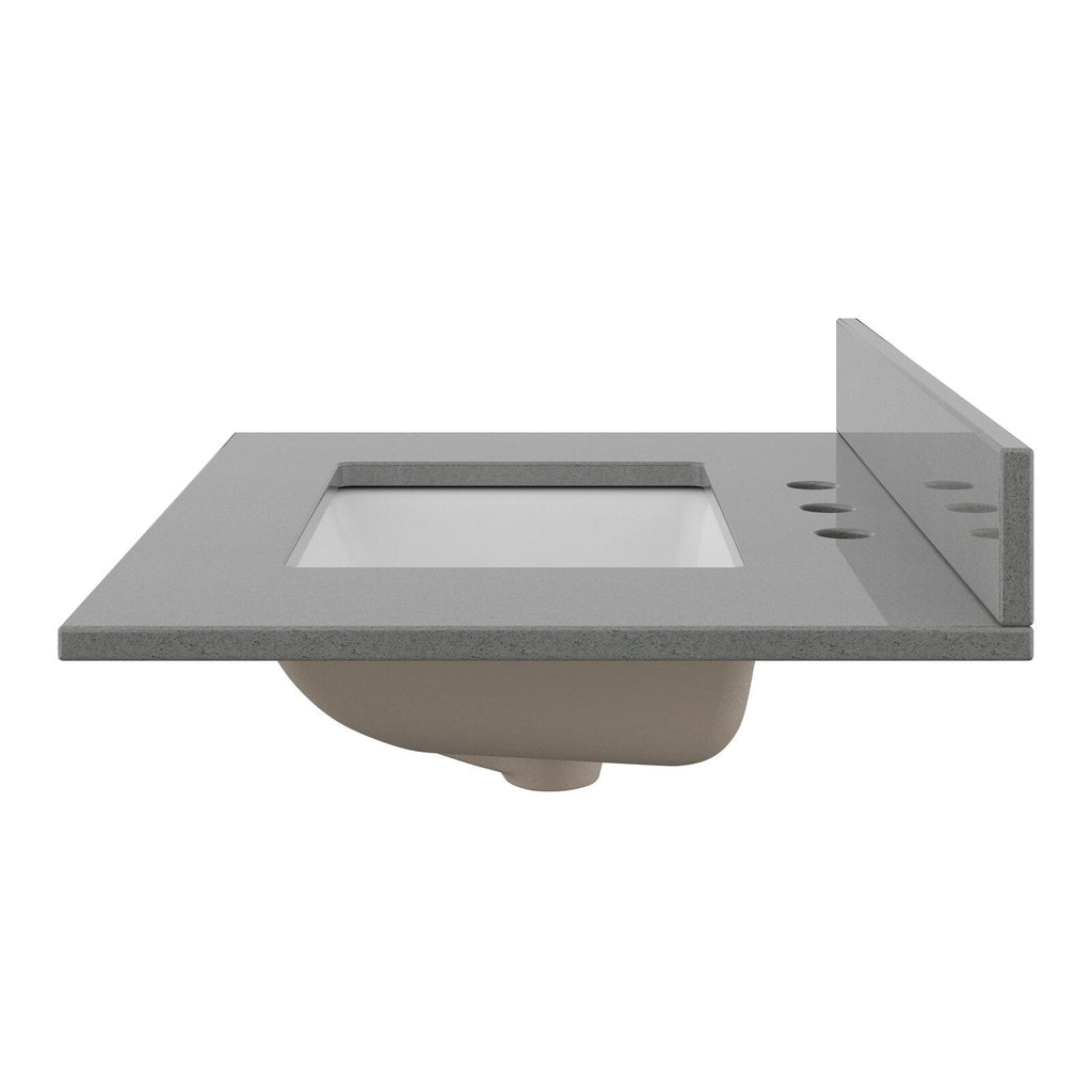 Stone-colored vanity top with a recessed rectangular white ceramic sink, matching stone backsplash on the right and three predrilled faucet holes; undermount sink basin is visible beneath the counter.