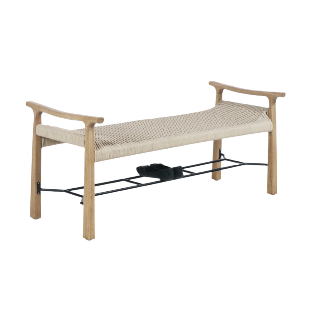 Beige woven rope-seat entryway bench with a natural wood frame and sculpted arms, featuring a black metal shoe rack underneath holding a pair of black shoes on a white background.