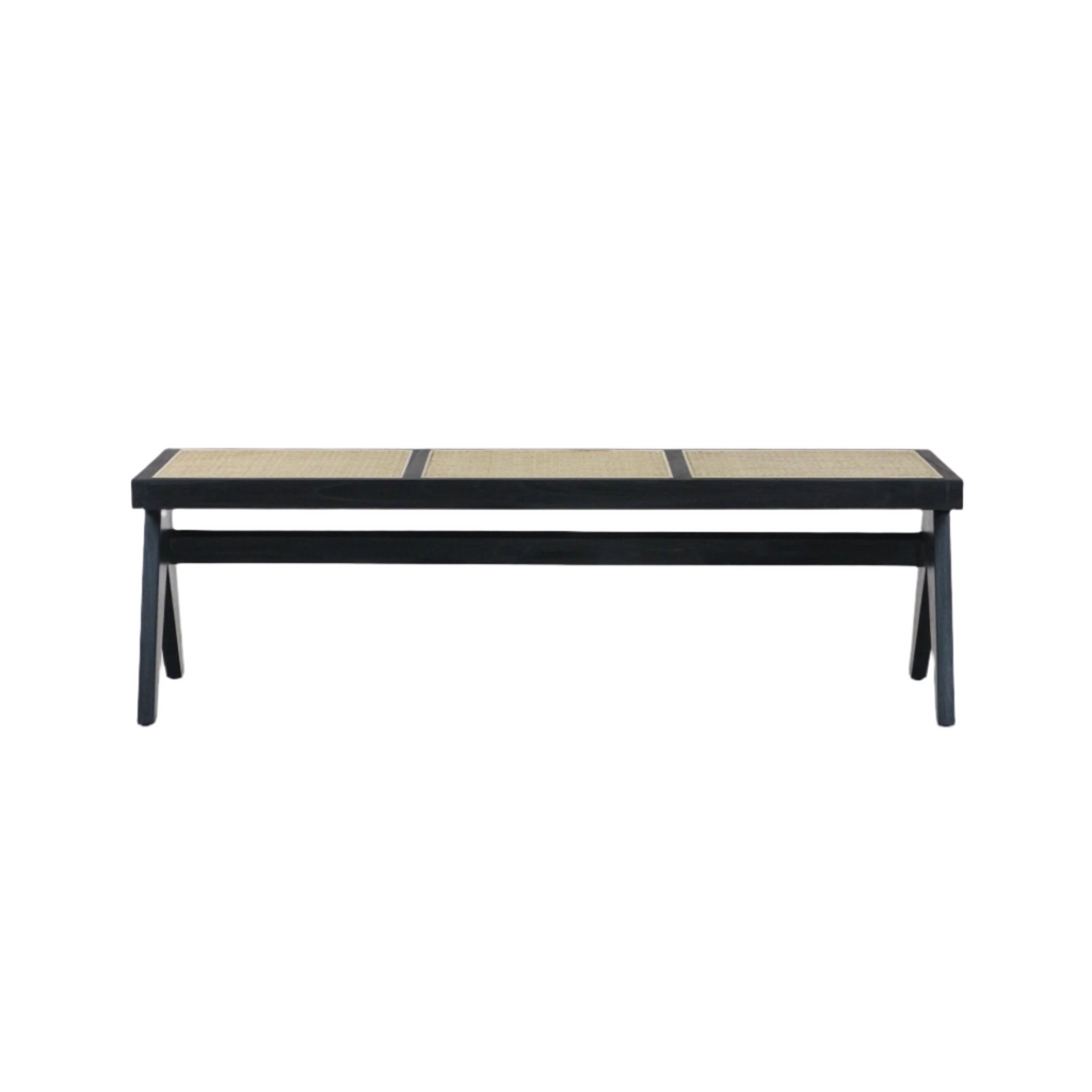 Backless modern wooden bench with a black solid wood frame and three natural woven cane seat panels, tapered splayed legs and a lower stretcher support, shown on a white background.