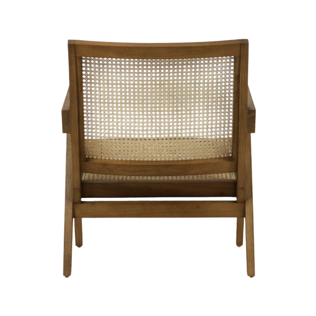 Rear view of a natural wood lounge chair with woven rattan cane back and seat, visible wooden arms, slatted lower support and tapered legs in a mid-century modern style.