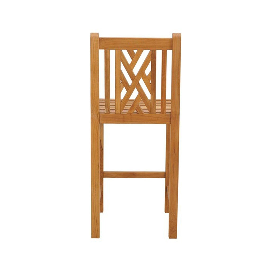 Rear view of an armless outdoor bar stool in natural teak, featuring a slatted seat, geometric crisscross backrest and straight square legs in a coastal wood finish.