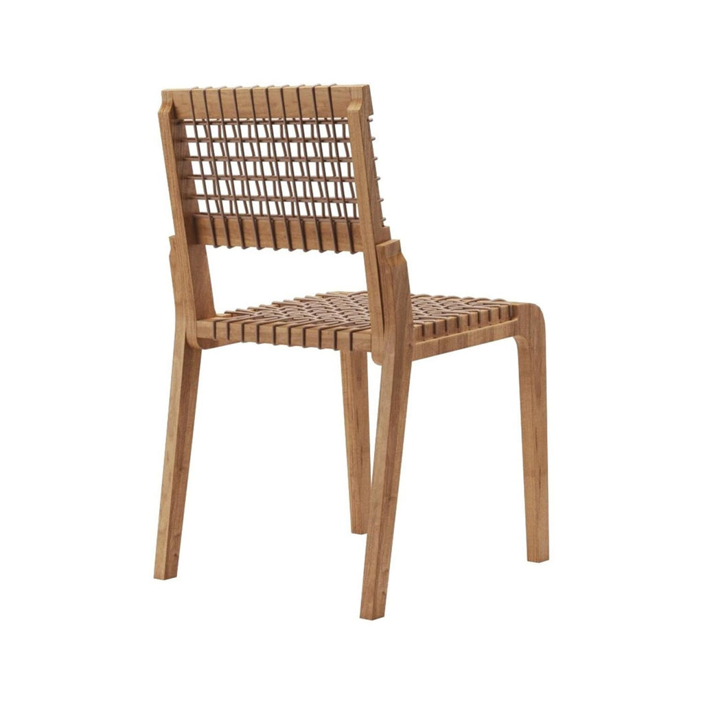Armless natural teak outdoor dining chair with solid wood frame and woven rattan-style lattice seat and full back, shown in three-quarter view; minimalist coastal stackable design.