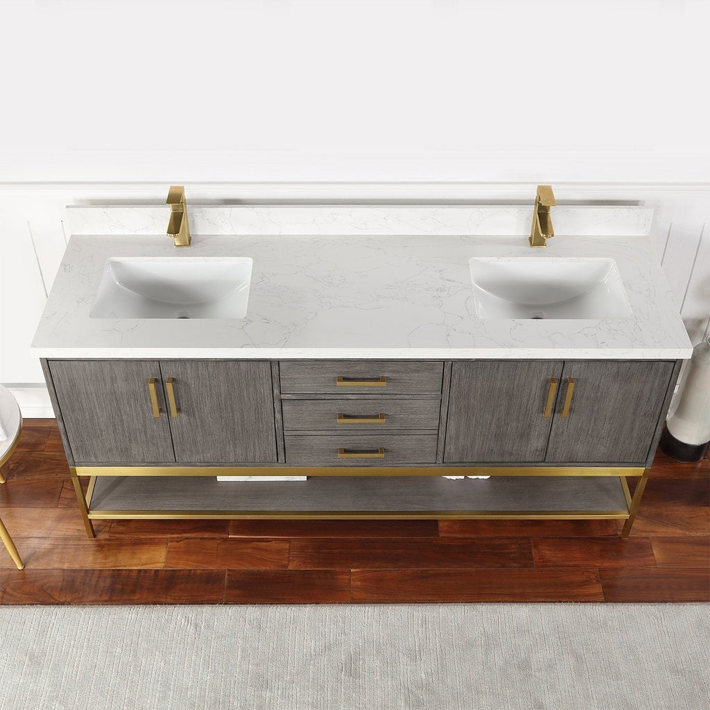 72-inch freestanding solid wood double-sink bathroom vanity with white stone-look countertop and integrated rectangular ceramic sinks, gray wood finish, brass-gold faucets and handles, and open lower shelf for storage.