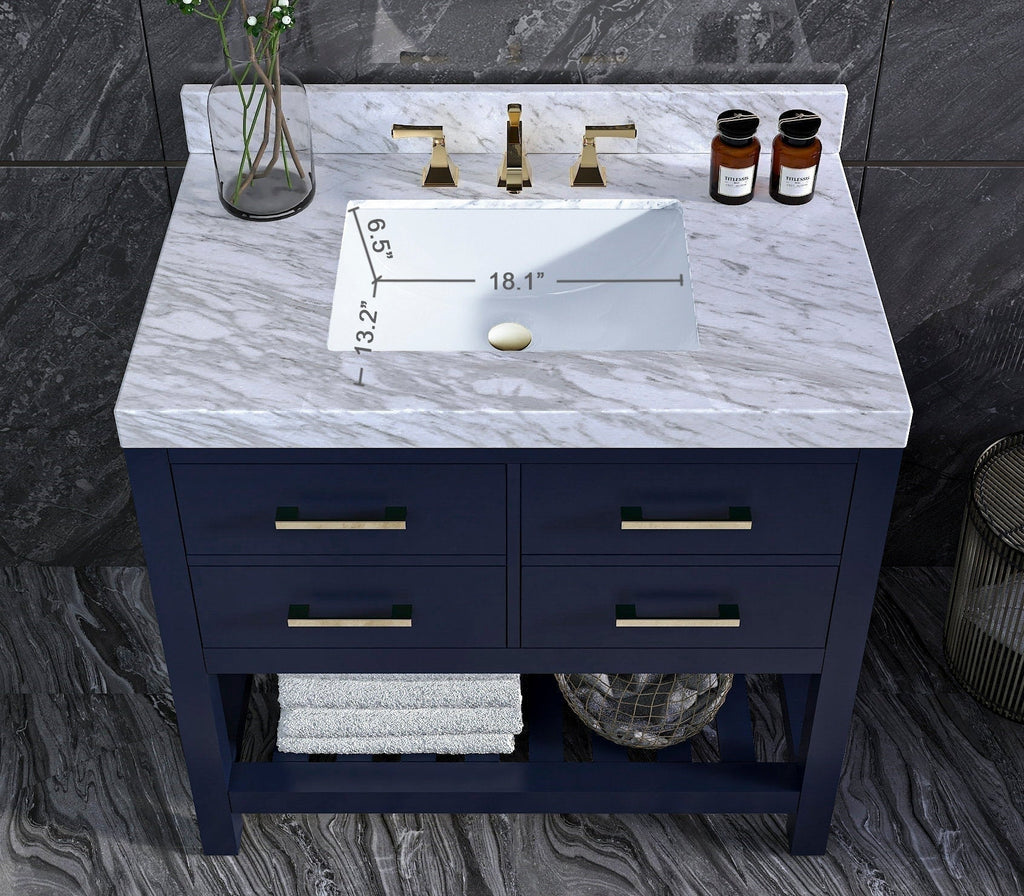Modern solid-wood 36-inch bathroom vanity with a stone marble top, rectangular undermount ceramic sink, brushed-gold faucet and hardware, navy painted base and open lower storage shelf.
