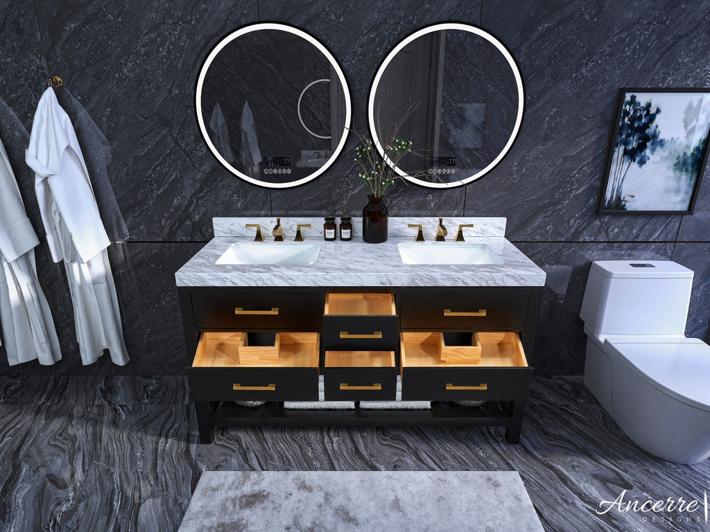Modern 60-inch double-sink solid wood vanity with white stone (marble) top, two undermount ceramic sinks, brushed gold faucets and handles, open drawers showing natural wood interiors and two round LED mirrors on a dark stone wall.