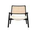Front view of a modern mahogany wood lounge chair with a woven cane backrest and a cushioned ivory fabric seat, low-profile silhouette with curved armrests and angled legs on a white background.