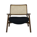 Mid-century modern teak lounge chair with a woven cane backrest and black fabric upholstered seat, low-profile wooden frame and tapered angled legs.