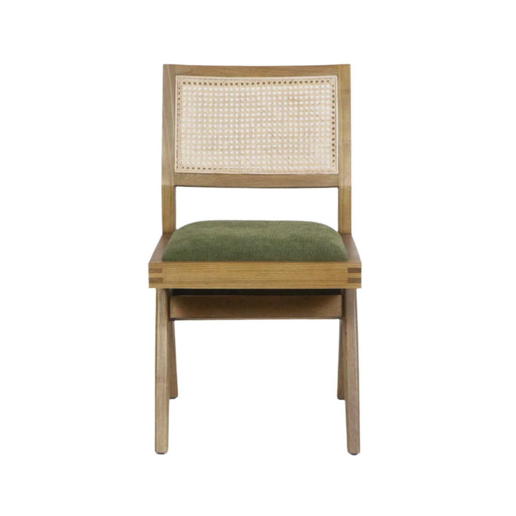 Front view of a mid-century modern armless side chair with a solid ash wood frame, woven cane backrest and a green chenille upholstered seat.