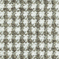 Close-up of beige, gray and white boucle upholstery fabric showing a textured looped weave in a subtle checker pattern, suitable for contemporary sofas; 70% acrylic, 30% polyester.