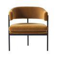 Front view of a mustard velvet upholstered lounge chair with a curved open back, plush layered seat cushion and slim black metal frame and legs, a mid-century modern glam accent for living rooms.