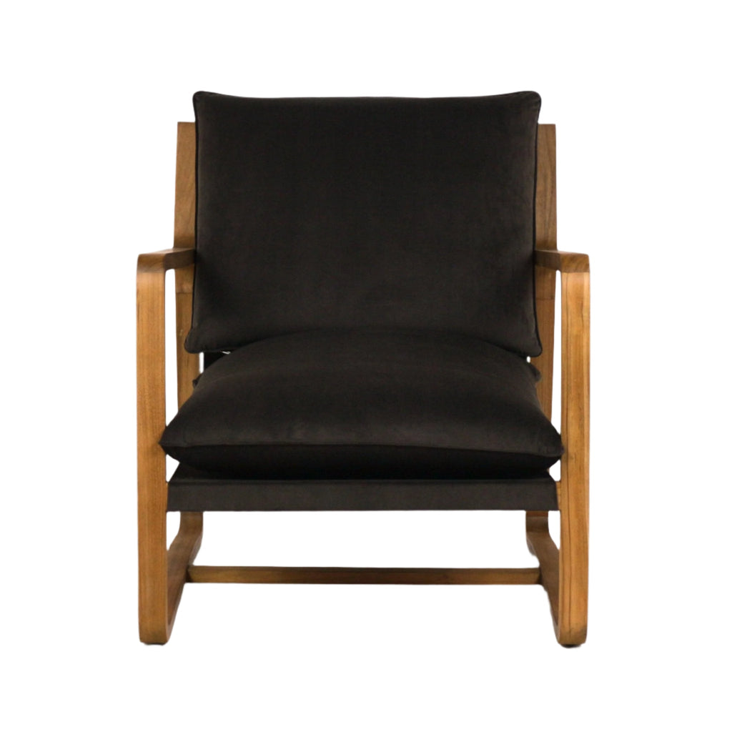 Front view of an olive-green velvet upholstered accent chair with a solid oak frame, angled wooden arms and plush seat and back cushions in a mid-century modern style.
