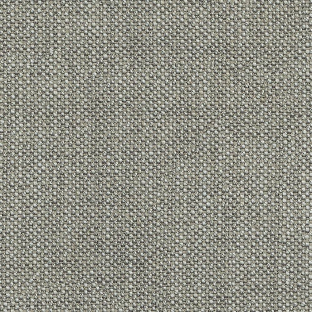 Close-up of neutral beige woven upholstery fabric showing a small pebble-like texture, intended for contemporary sofas; fabric blend includes cotton, rayon, wool, acrylic and triacetate.