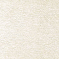 Close-up of cream boucle upholstery fabric showing soft, nubby texture; 87% polyester with 6% linen and 7% rayon, suitable for indoor sofa upholstery.