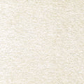 Close-up of cream boucle upholstery fabric showing soft, nubby texture; 87% polyester with 6% linen and 7% rayon, suitable for indoor sofa upholstery.