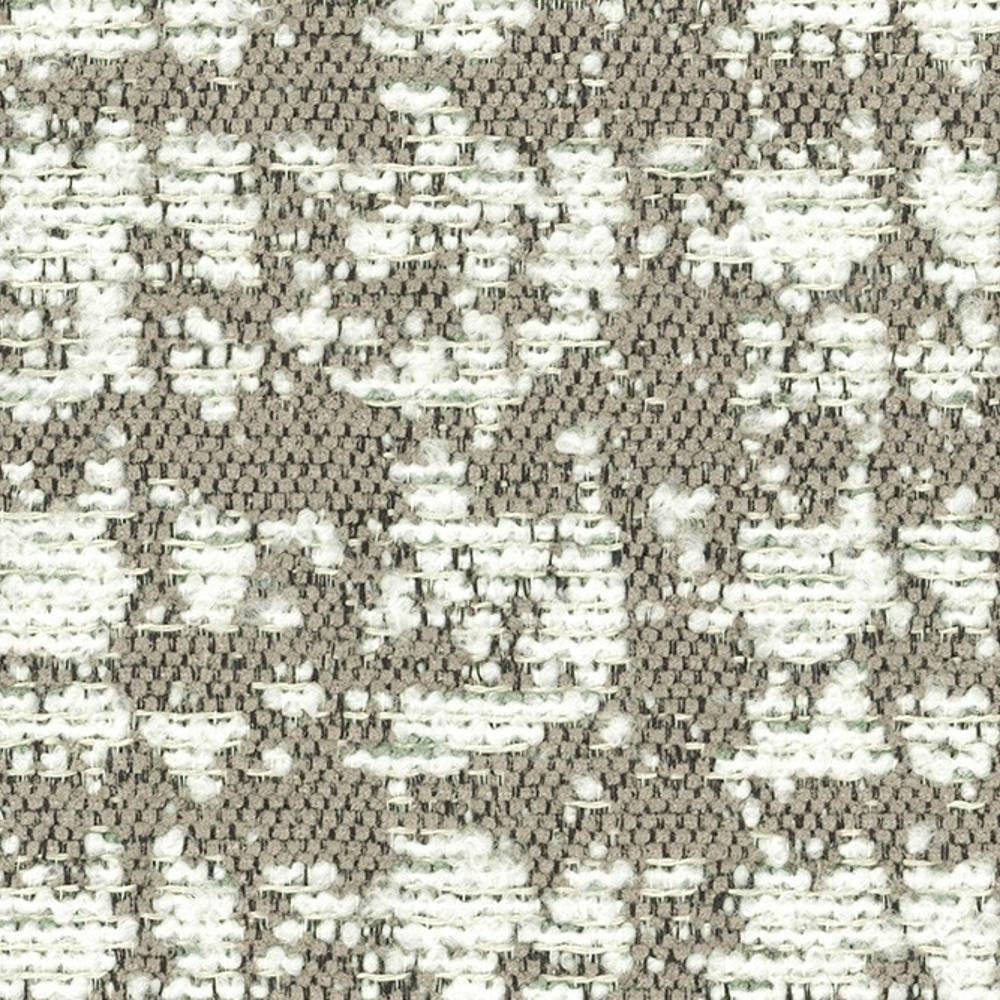 Close-up of neutral beige woven upholstery fabric with raised white boucle-like yarns creating a subtle abstract pattern; textured contemporary sofa fabric made from viscose, acrylic and polyester.