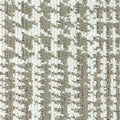 Close-up of beige and gray contemporary upholstery fabric showing a woven taupe background with white boucle-like textured flecks forming a subtle vertical stripe pattern; 29% viscose, 11% acrylic, 60% polyester.