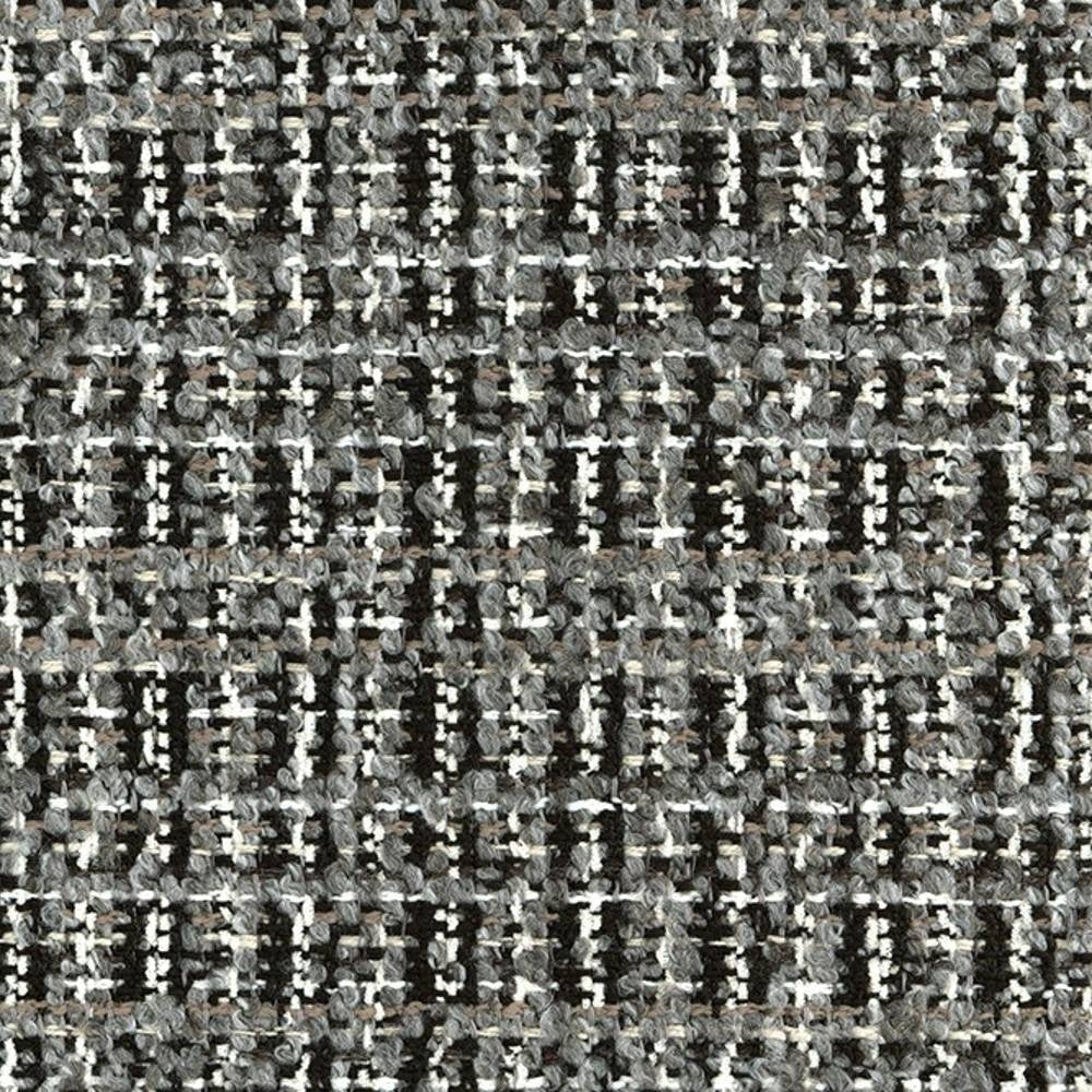 Close-up of gray, white and black boucle upholstery fabric showing looped woven texture in a subtle grid pattern; 14% acrylic, 12% viscose, 74% polyester.