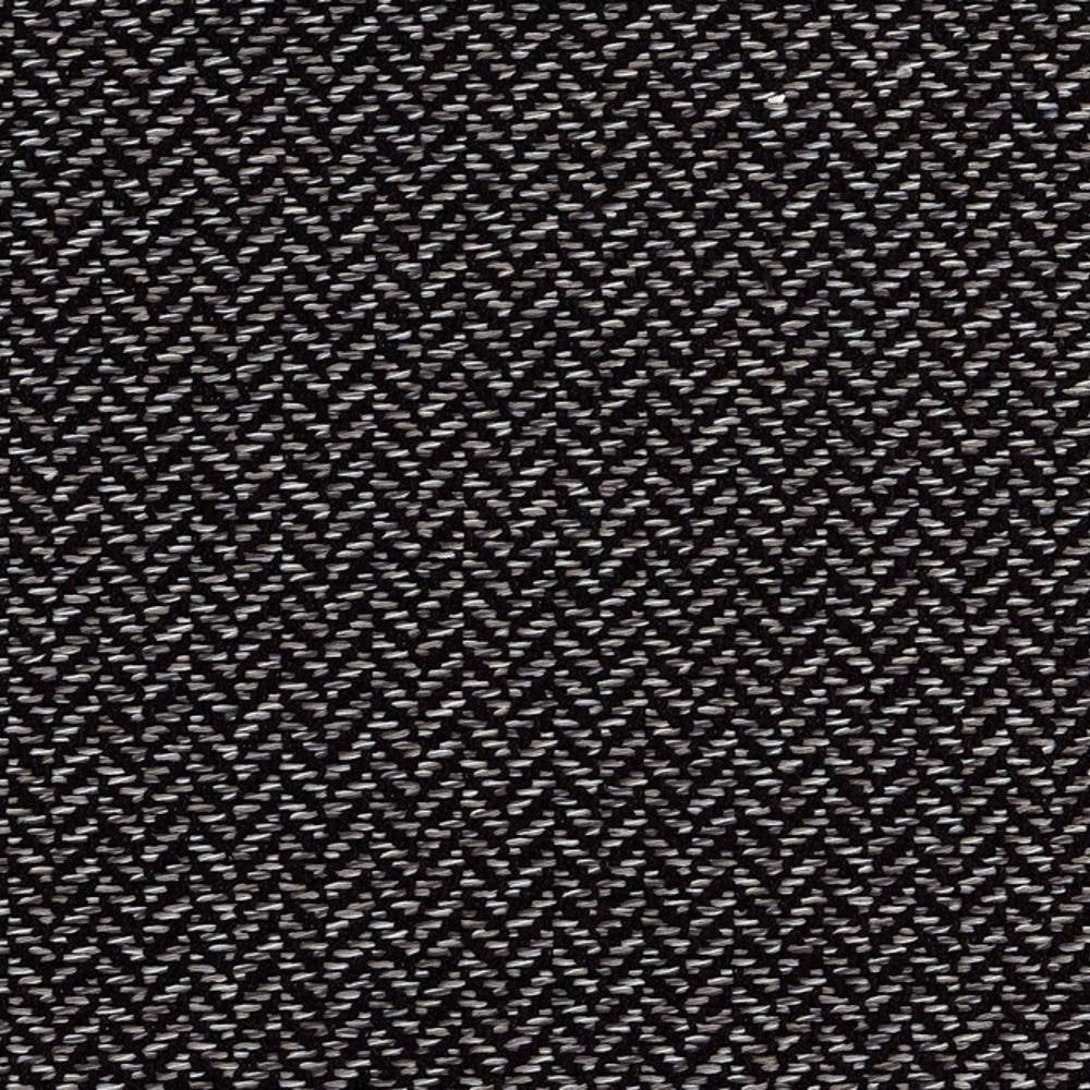 Close-up of a neutral woven upholstery fabric showing a dense small-scale herringbone chevron pattern in dark and light threads; 38% rayon, 62% polyester, for contemporary and modern sofas or office seating.