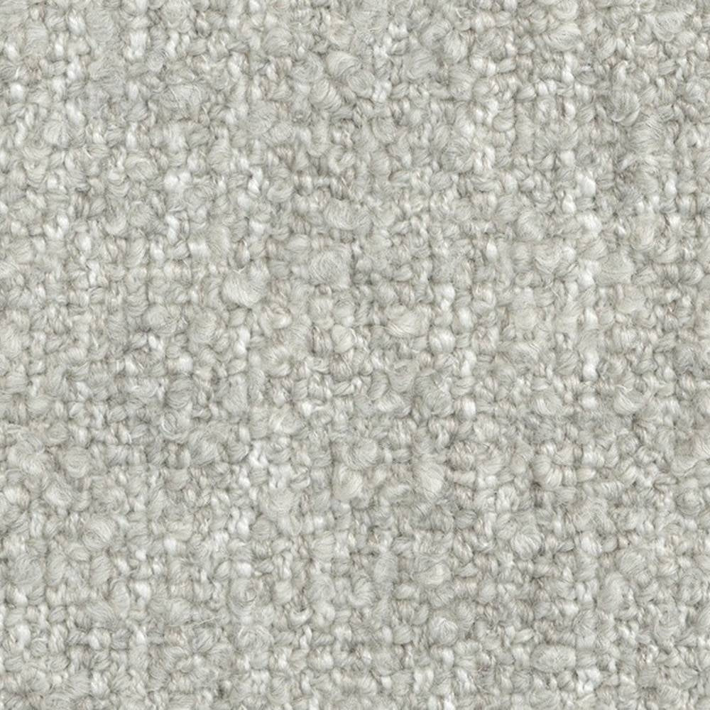 Close-up of light neutral boucle upholstery fabric showing dense looped texture; 24% wool, 66% acrylic, 10% polyester blend designed for contemporary sofa upholstery.