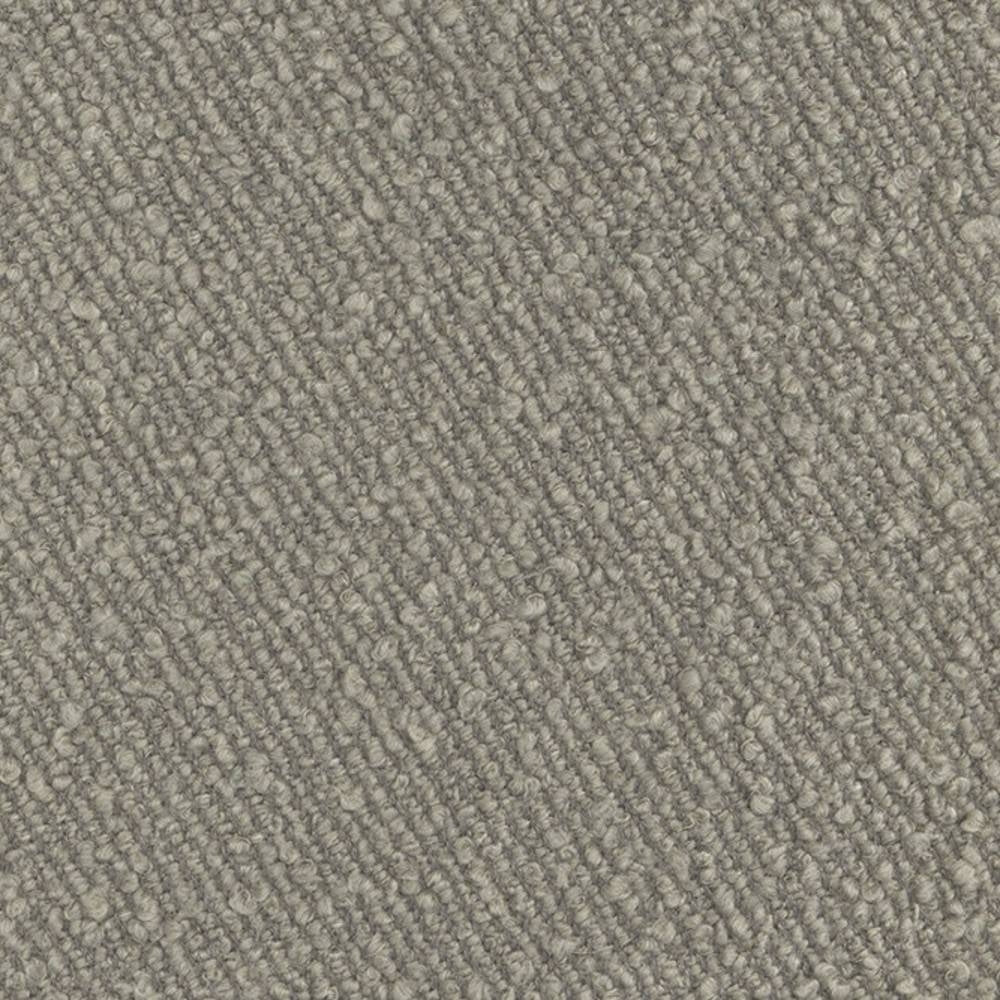 Close-up of cream boucle upholstery fabric showing dense looped weave and subtle diagonal ribbing; a wool, linen, viscose, acrylic and polyester blend intended for sofa upholstery.