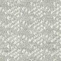 Close-up of light gray boucle upholstery fabric showing looped texture and creamy white flecks; a heavy-duty 20% wool, 69% acrylic, 11% polyester blend suitable for contemporary sofas.