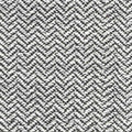Close-up of gray and white herringbone upholstery fabric showing a textured looped weave; 13% wool, 50% acrylic, 37% polyester, suitable for contemporary sofa upholstery.