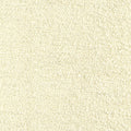 Close-up of cream boucle upholstery fabric showing tight looped wool-blend texture (30% wool, 40% acrylic, 30% polyester), ideal for contemporary sofa upholstery.