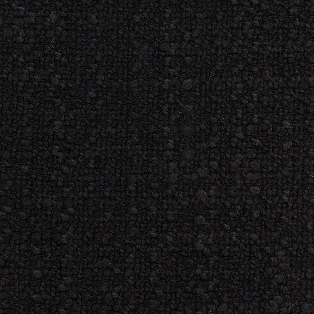 Close-up of black boucle upholstery fabric showing dense nubby looped texture, suitable for heavy-duty sofa upholstery; 73% rayon and 27% triacetate composition.