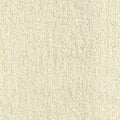 Close-up of cream boucle upholstery fabric showing a soft looped texture; contemporary sofa fabric in a 25% wool, 50% acrylic, 25% triacetate blend.