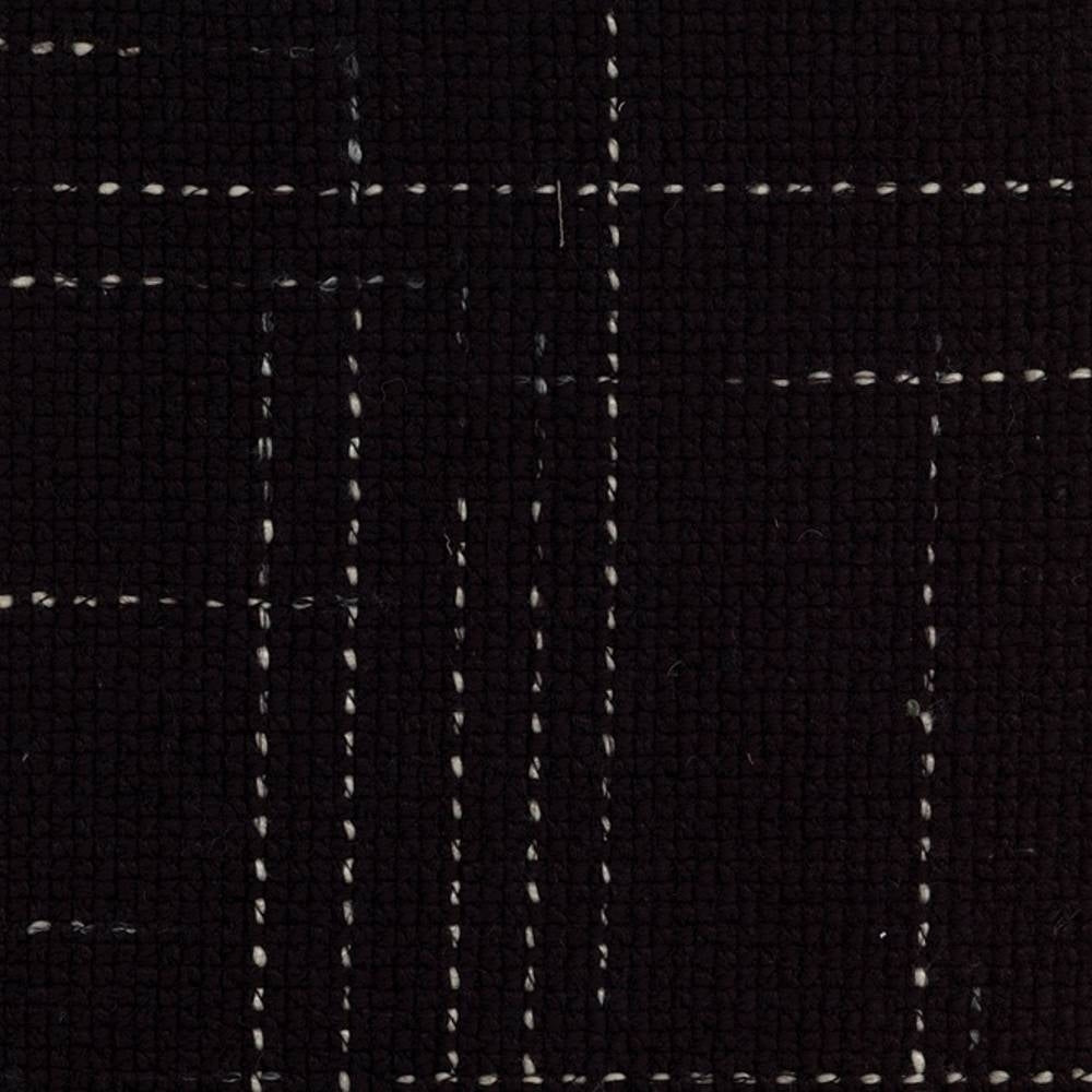 Close-up of black windowpane upholstery fabric in a 30% wool, 54% acrylic, 14% triacetate blend, showing textured weave and thin white stitched grid lines for contemporary, modern sofas or office seating.