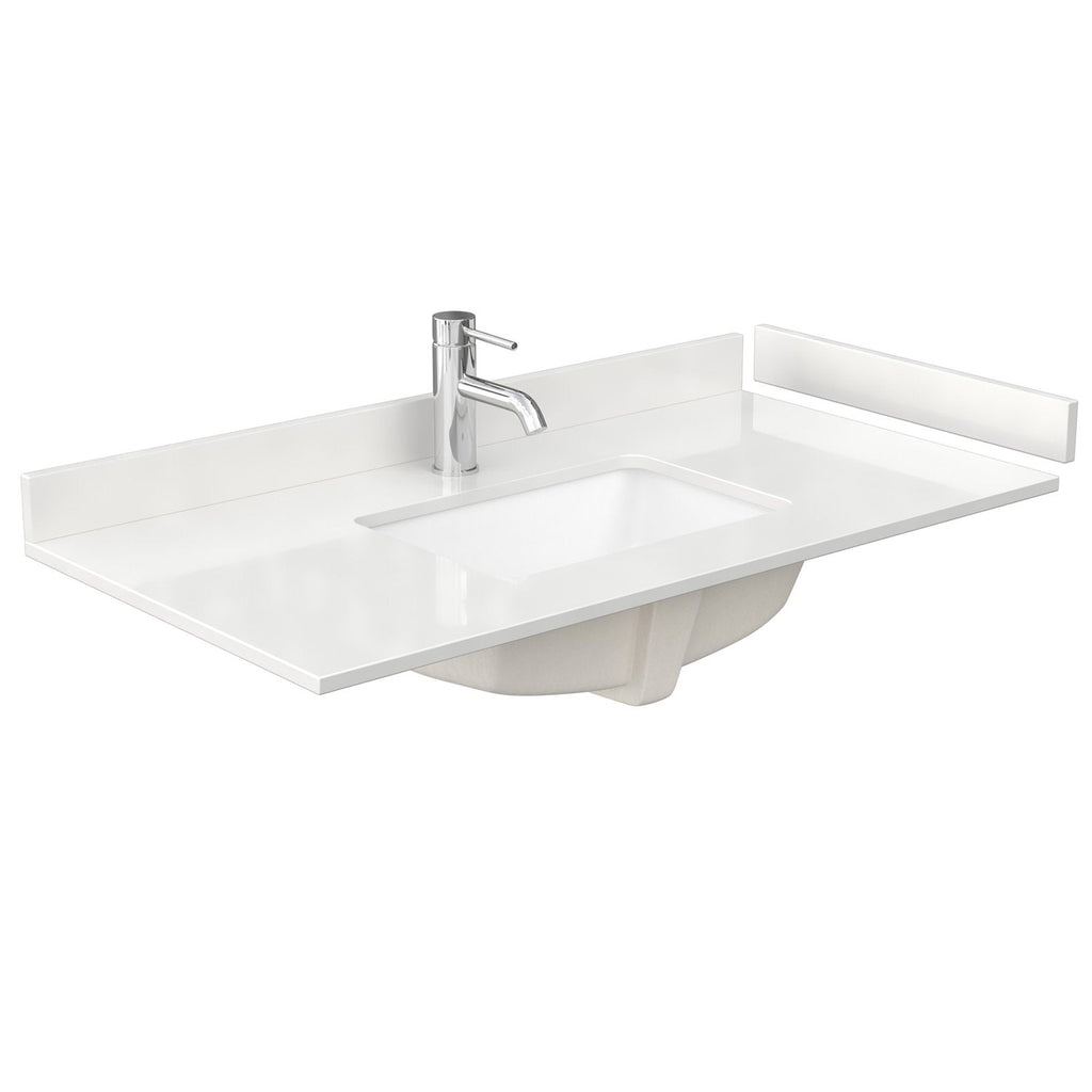 Stone-colored vanity top with integrated rectangular sink and single chrome faucet, low backsplash strips, and the underside of the undermount basin visible from the side.