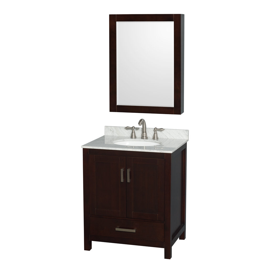 Contemporary freestanding single-sink vanity in dark solid wood with a white stone marble top, undermount ceramic sink, brushed nickel faucet, storage doors with metal pulls, and a matching framed mirror above.
