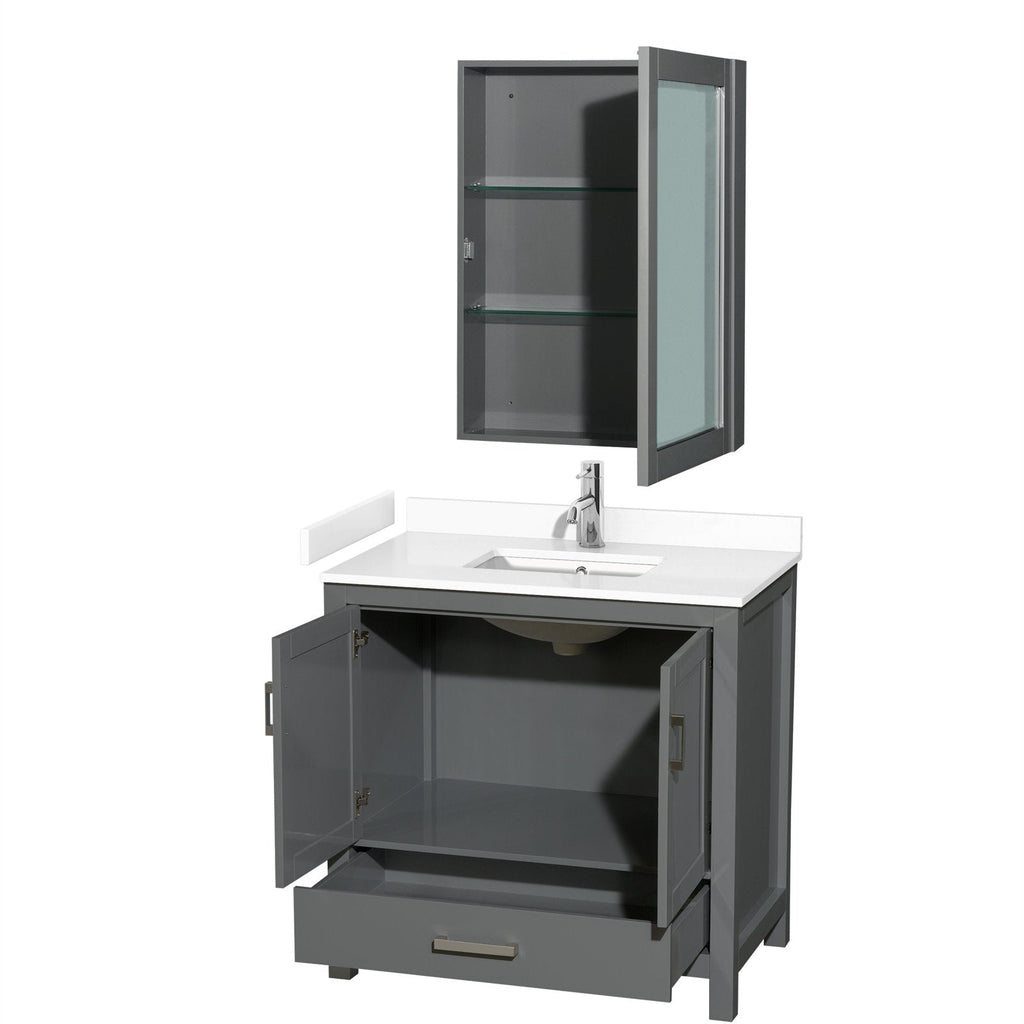 Modern gray solid wood bathroom vanity with white stone countertop and integrated ceramic sink, chrome single-handle faucet, open cabinet doors showing interior storage and drawer, plus matching wall-mounted gray medicine cabinet with glass shelves.